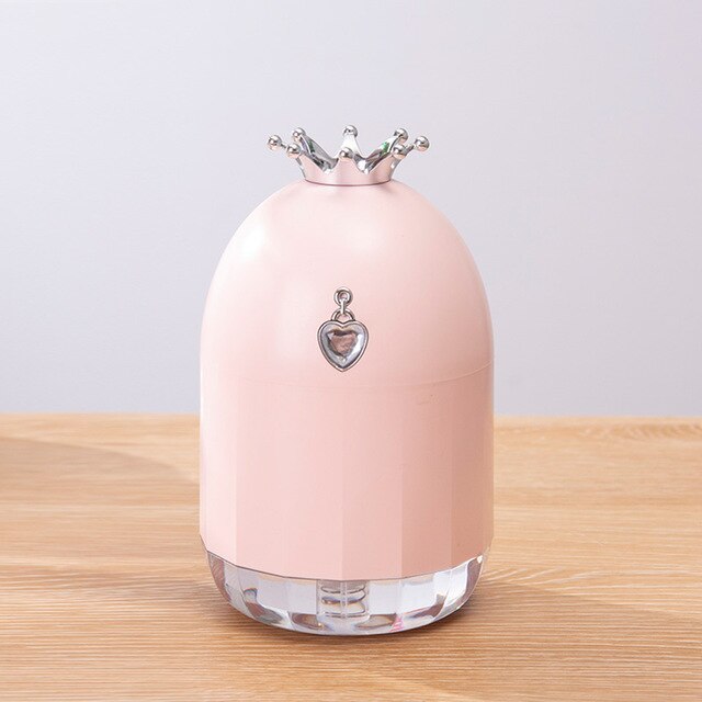 Humidificador de siete colores, pequeño producto nuevo y creativo, suplemento de agua, silenciador de corona, electrodomésticos en aerosol.