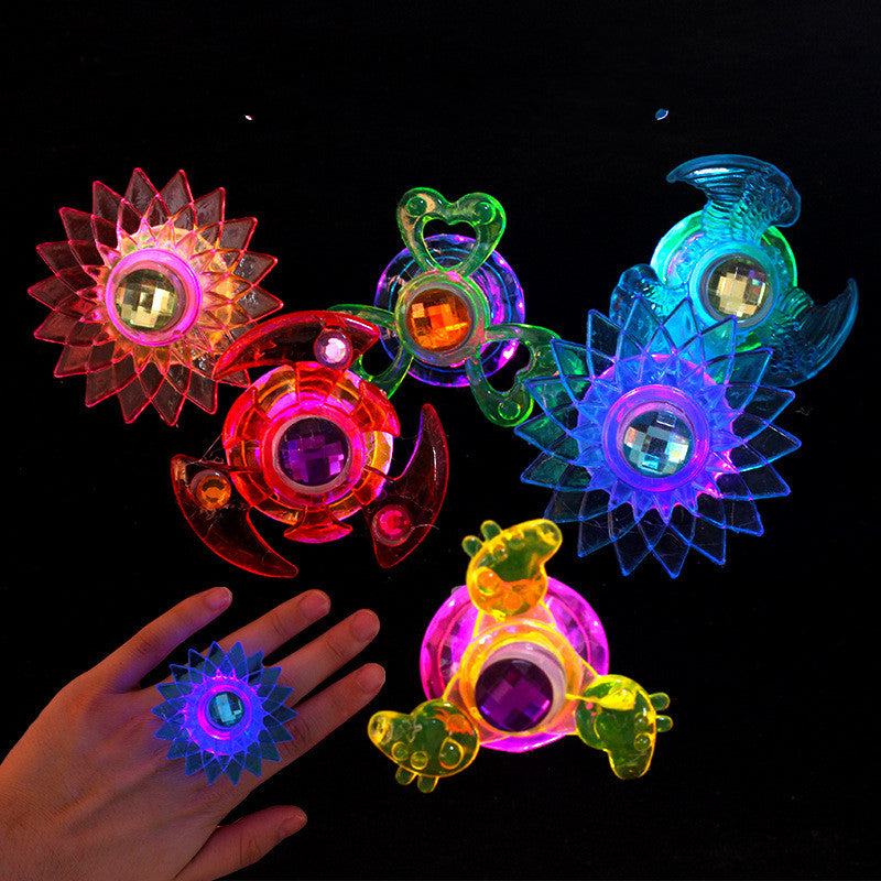 Children's luminous toy top finger light