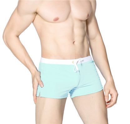 Color: Light Blue, Size: L - Men's Solid Color Fashion Back Pocket Design Swimming Trunks